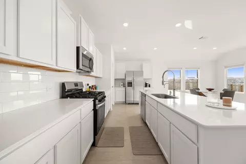 Kitchen - 1612 Devine Lake Bnd, Leander, TX 78641 photo 4 of 6
