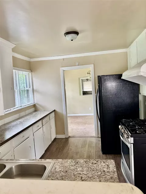Kitchen - 415 E 7th St, Taylor, TX 76574 photo 5 of 5