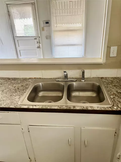 Kitchen - 415 E 7th St, Taylor, TX 76574 photo 4 of 5
