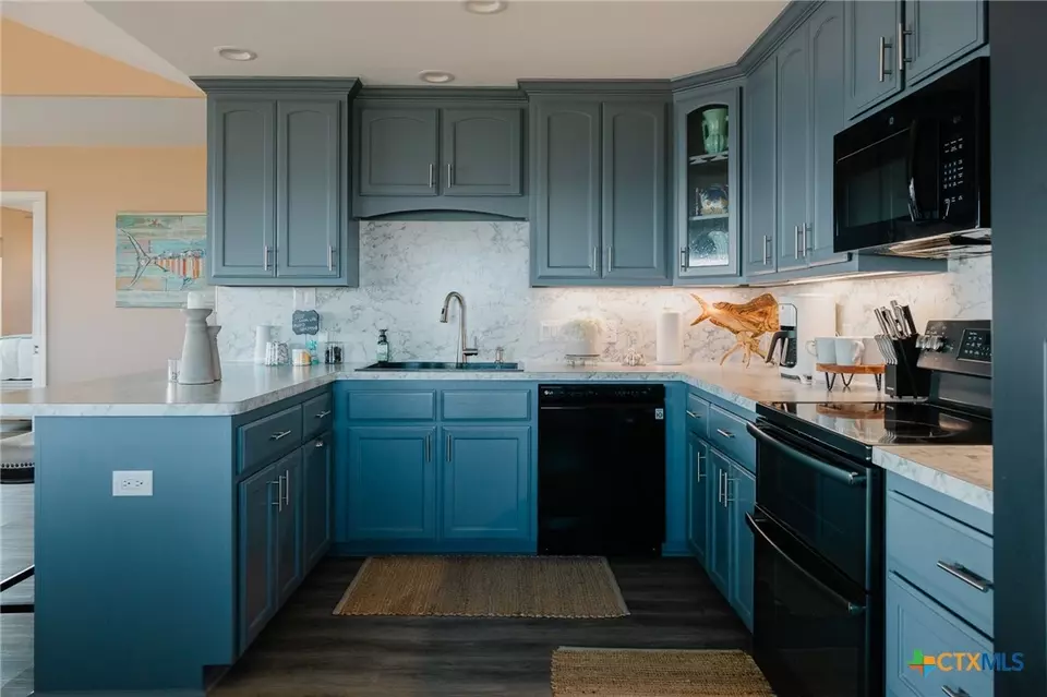 Kitchen - 299 Bay Dr, Palacios, TX 77465 photo 2 of 2