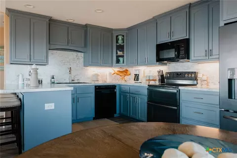 Kitchen - 299 Bay Dr, Palacios, TX 77465 photo 1 of 2