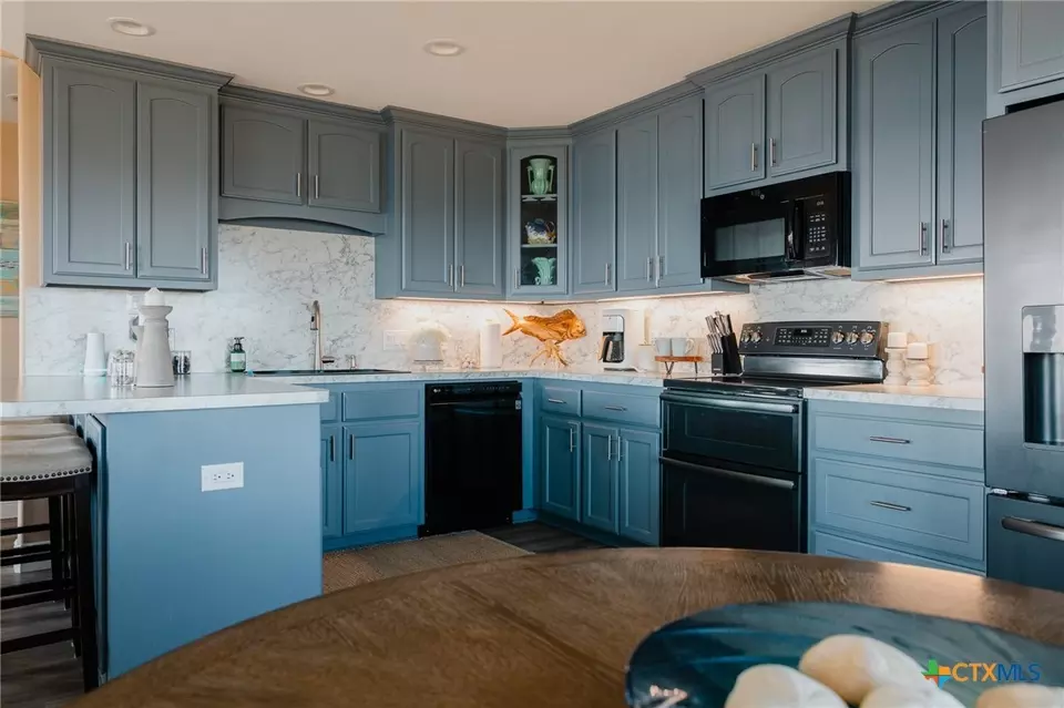 Kitchen - 299 Bay Dr, Palacios, TX 77465 photo 1 of 2