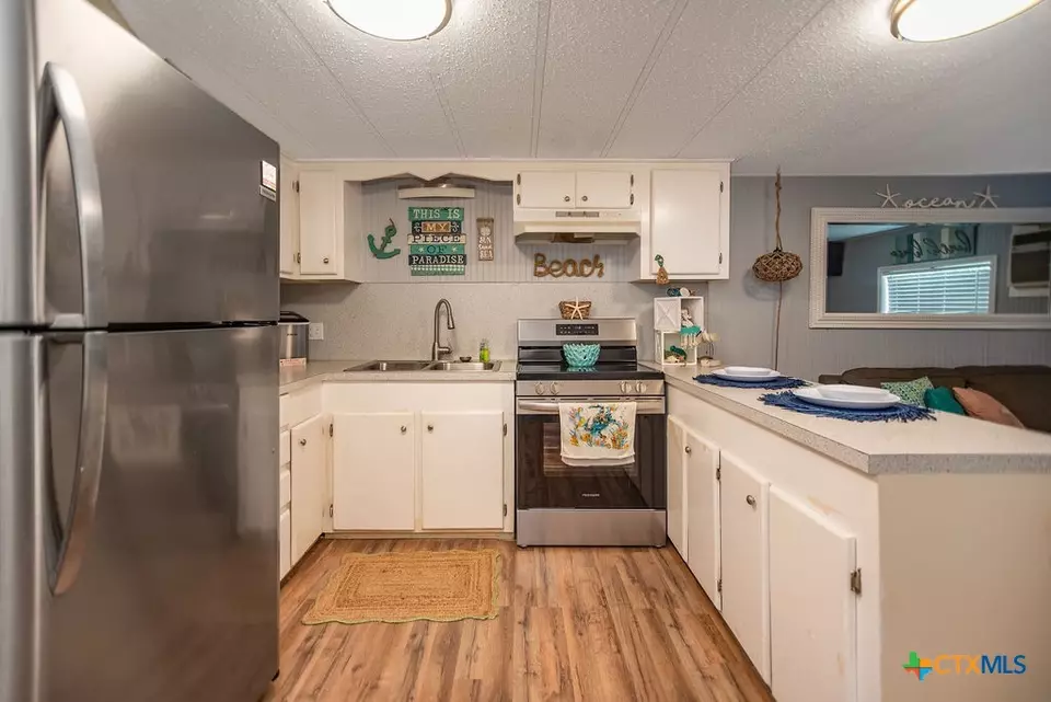 Kitchen - 1207 W Madison Ave, Port O'connor, TX 77982 photo 2 of 3