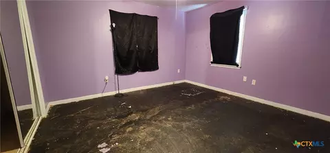 Bedroom - 604 Davis St, Edna, TX 77957 photo 3 of 5