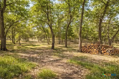 Exterior - 408 Rust Ranch Rd, Blanco, TX 78606 photo 6 of 9