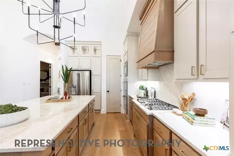 Kitchen - 212 Borrego Bnd, Liberty Hill, TX 78642 photo 3 of 5