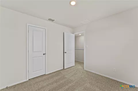 Bedroom - 140 Kendall Ln, Uhland, TX 78656 photo 2 of 4