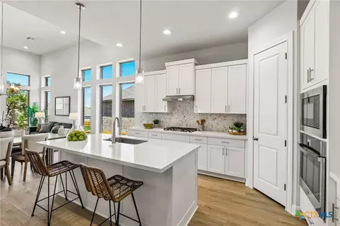 Kitchen - 310 Prickly Poppy Loop, Kyle, TX 78640 photo 2 of 3