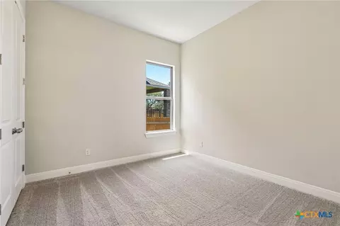 Bedroom - 310 Prickly Poppy Loop, Kyle, TX 78640 photo 4 of 9