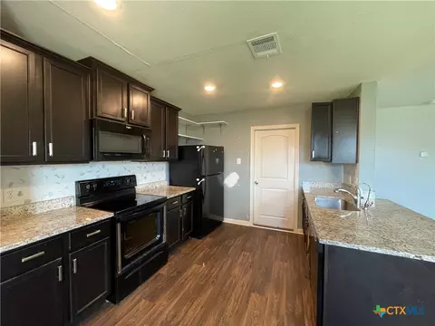 Kitchen - 409 Wincliff Ln, Jarrell, TX 76537 photo 2 of 4