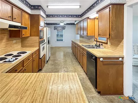 Kitchen - 802 E 14th St, Cameron, TX 76520 photo 1 of 3