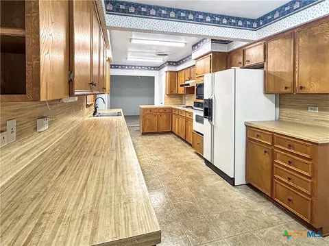 Kitchen - 802 E 14th St, Cameron, TX 76520 photo 2 of 3