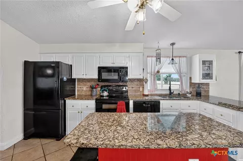 Kitchen - 317 Rae Ln, Jarrell, TX 76537 photo 2 of 3