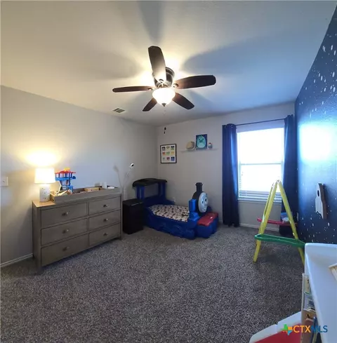 Bedroom - 129 Diamondback Cv, Buda, TX 78610 photo 4 of 5