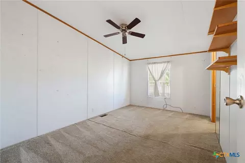 Bedroom - 114 Pleasant Grove Loop, Elgin, TX 78621 photo 2 of 4