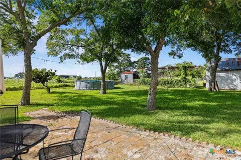 Exterior - 701 S Gilbert Rd, Edna, TX 77957 photo 6 of 11