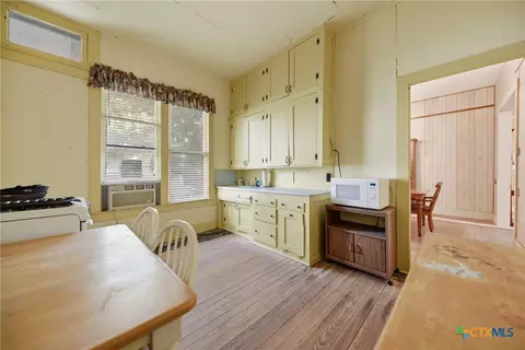 Kitchen - 124 S Avenue I, Shiner, TX 77984 photo 2 of 3