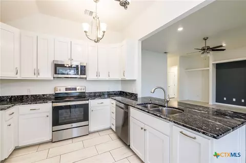Kitchen - 228 Plum St, Luling, TX 78648 photo 2 of 2