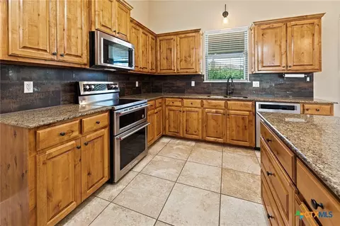 Kitchen - 608 Jake Dr, Jarrell, TX 76537 photo 4 of 10