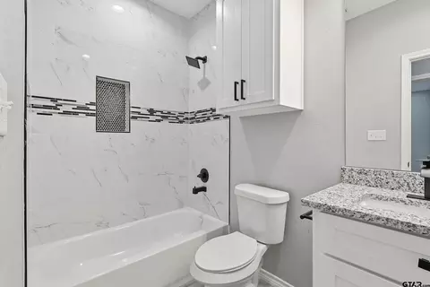 Bath - 1007 E 1st St, Mount Pleasant, TX 75455 photo 2 of 2
