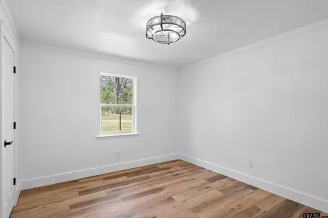 Bedroom - 135 County Road 1105, Daingerfield, TX 75638 photo 2 of 3