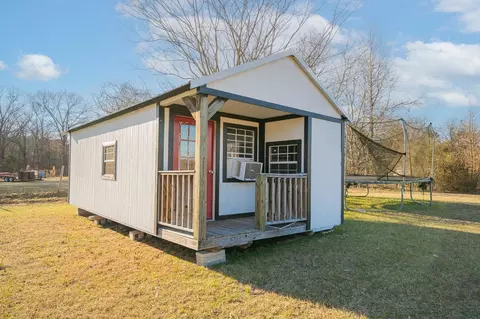 Exterior - 1557 Driskell Bridge Rd, Harleton, TX 75651 photo 3 of 4