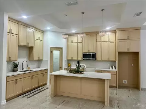 Kitchen - 403 S 12th St, Alamo, TX 78516 photo 1 of 2