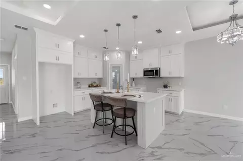 Kitchen - 228 Merida Dr, Donna, TX 78537 photo 2 of 3