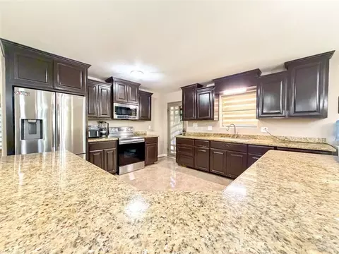 Kitchen - 905 E Scurlock Dr, Pharr, TX 78577 photo 2 of 5