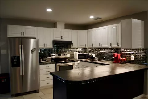 Kitchen - 1001 E Hefferman St, Beeville, TX 78102 photo 1 of 2