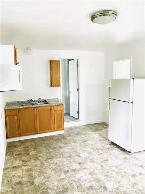 Kitchen - 319 S Nueces St, Mathis, TX 78368 photo 2 of 2