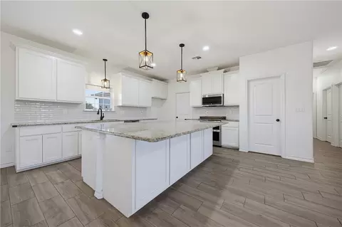 Kitchen - 10023 County Rd 597 Hwy 9, Mathis, TX 78368 photo 1 of 4