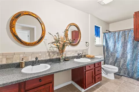 Bath - 107 E Lakefield Dr, Mathis, TX 78368 photo 2 of 3