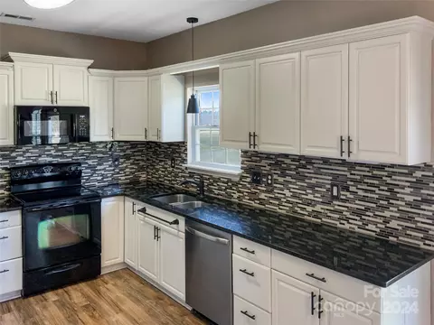 Kitchen - 492 Drumstand Rd, Stony Point, NC 28678 photo 2 of 3