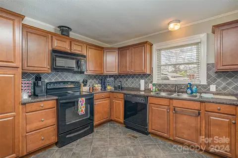 Kitchen - 435 S Main St, Stanley, NC 28164 photo 2 of 4