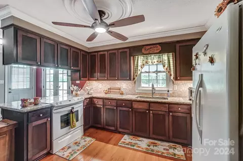 Kitchen - 5000 Tite Rd, Stanfield, NC 28163 photo 3 of 5