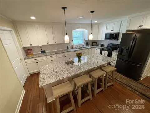 Kitchen - 213 Pine St, Biscoe, NC 27209 photo 3 of 3