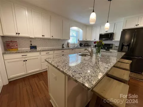 Kitchen - 213 Pine St, Biscoe, NC 27209 photo 2 of 3