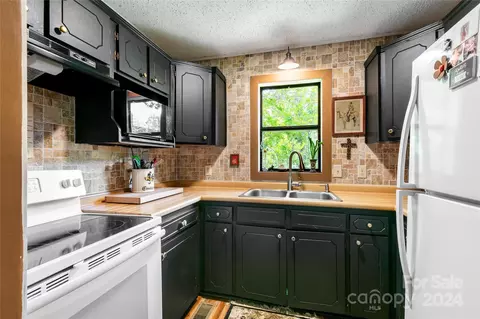 Kitchen - 313 E Howard St, Tryon, NC 28782 photo 2 of 2