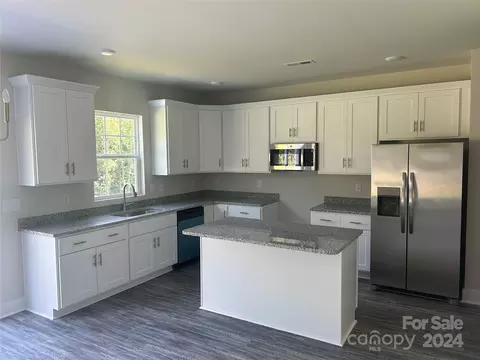 Kitchen - 910 Blake Rd, Albemarle, NC 28001 photo 2 of 2