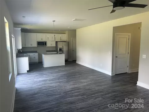 Living - 910 Blake Rd, Albemarle, NC 28001 photo 7 of 7