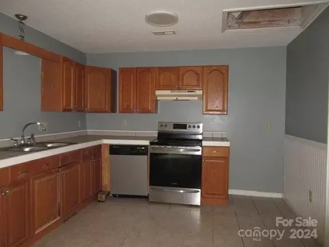 Kitchen - 50 Hawkins Ln, Mill Spring, NC 28756 photo 4 of 4