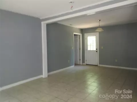 Living - 50 Hawkins Ln, Mill Spring, NC 28756 photo 1 of 2