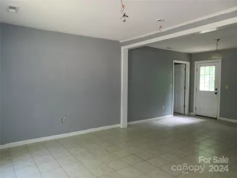 Living - 50 Hawkins Ln, Mill Spring, NC 28756 photo 2 of 2