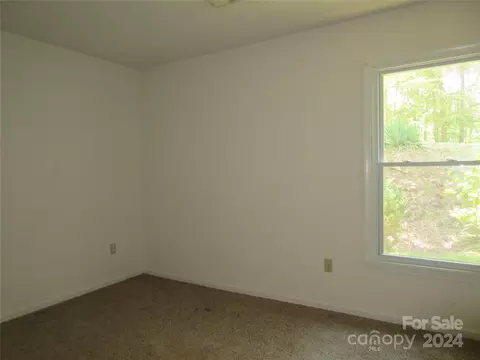 Bedroom - 50 Hawkins Ln, Mill Spring, NC 28756 photo 3 of 8