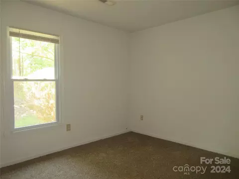 Bedroom - 50 Hawkins Ln, Mill Spring, NC 28756 photo 2 of 8