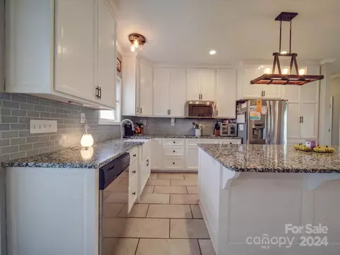 Kitchen - 26022 Lingerfelt Rd, Albemarle, NC 28001 photo 3 of 4