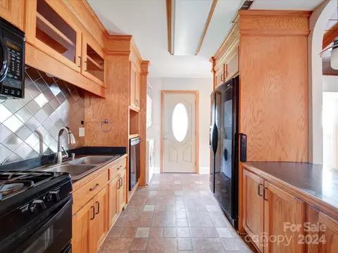 Kitchen - 100 E Green St, Monroe, NC 28112 photo 2 of 2