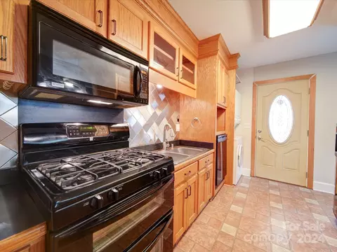 Kitchen - 100 E Green St, Monroe, NC 28112 photo 1 of 2
