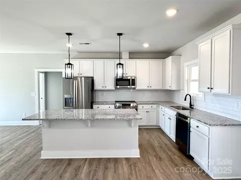 Kitchen - 723 E Memorial Hwy, Harmony, NC 28634 photo 1 of 2